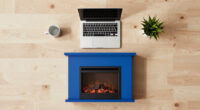 A Bold Blue Fireplace Is the Striking Focal Point of This Home Office