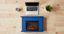 A Bold Blue Fireplace Is the Striking Focal Point of This Home Office